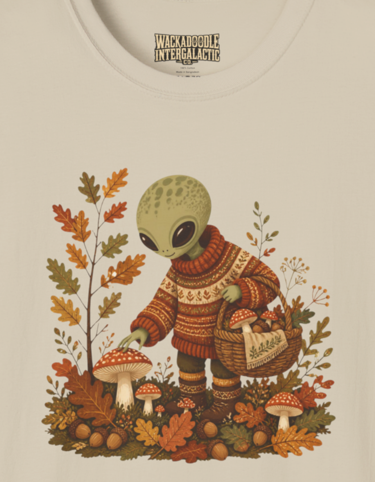 Alien Harvest T‑Shirt — Cute Space Creature in Cozy Sweater Picking Mushrooms (Fall Graphic)