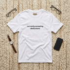 T-Shirt — "currently accepting abductions" Minimal Funny Graphic Tee