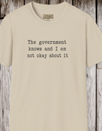Statement T-Shirt — “The government knows and I am not okay about it” Tee